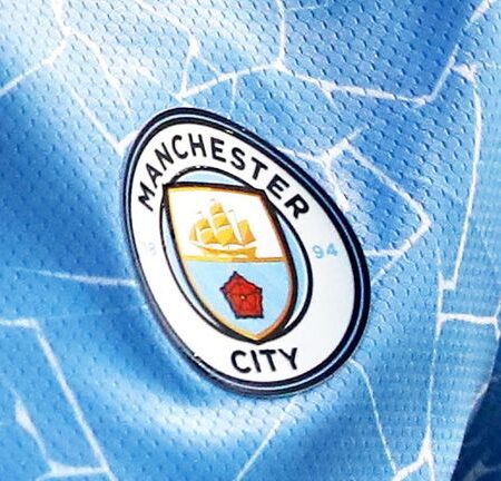 Manchester City verrast nadat het werd getroffen door de financiële lasten van de Premier League
